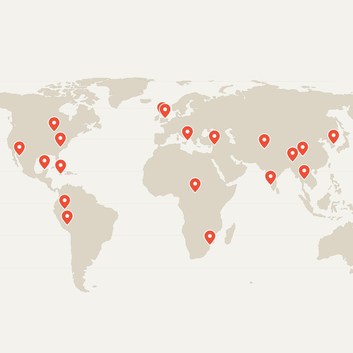 World map with a pin at the home of each chile pepper variety